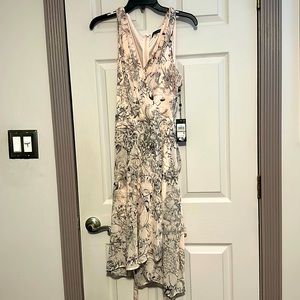 Tommy Hilfiger dress. Never worn, new with tags. Fits perfectly to size.